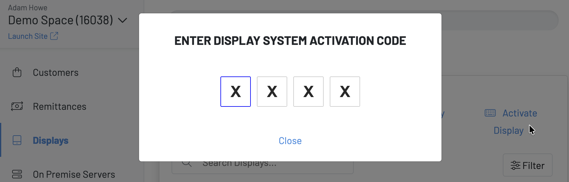 Enter Display System Activation Code window in the Manager Dashboard