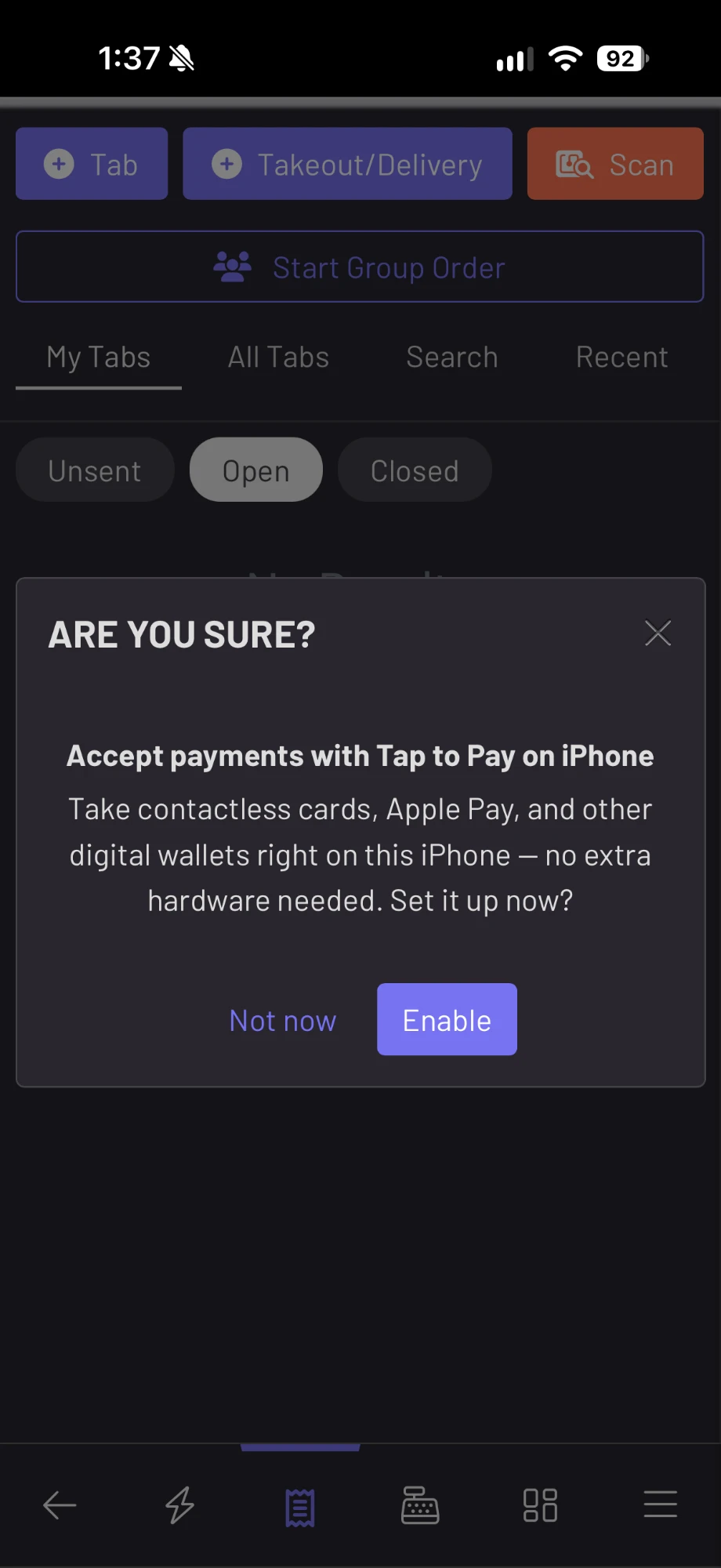 Prompt to accept payments with Tap to Pay on iPhone, with Not now and Enable buttons